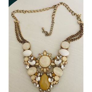 Beautiful Vintage Necklace with rhinestone and Mother of pearl like accents.